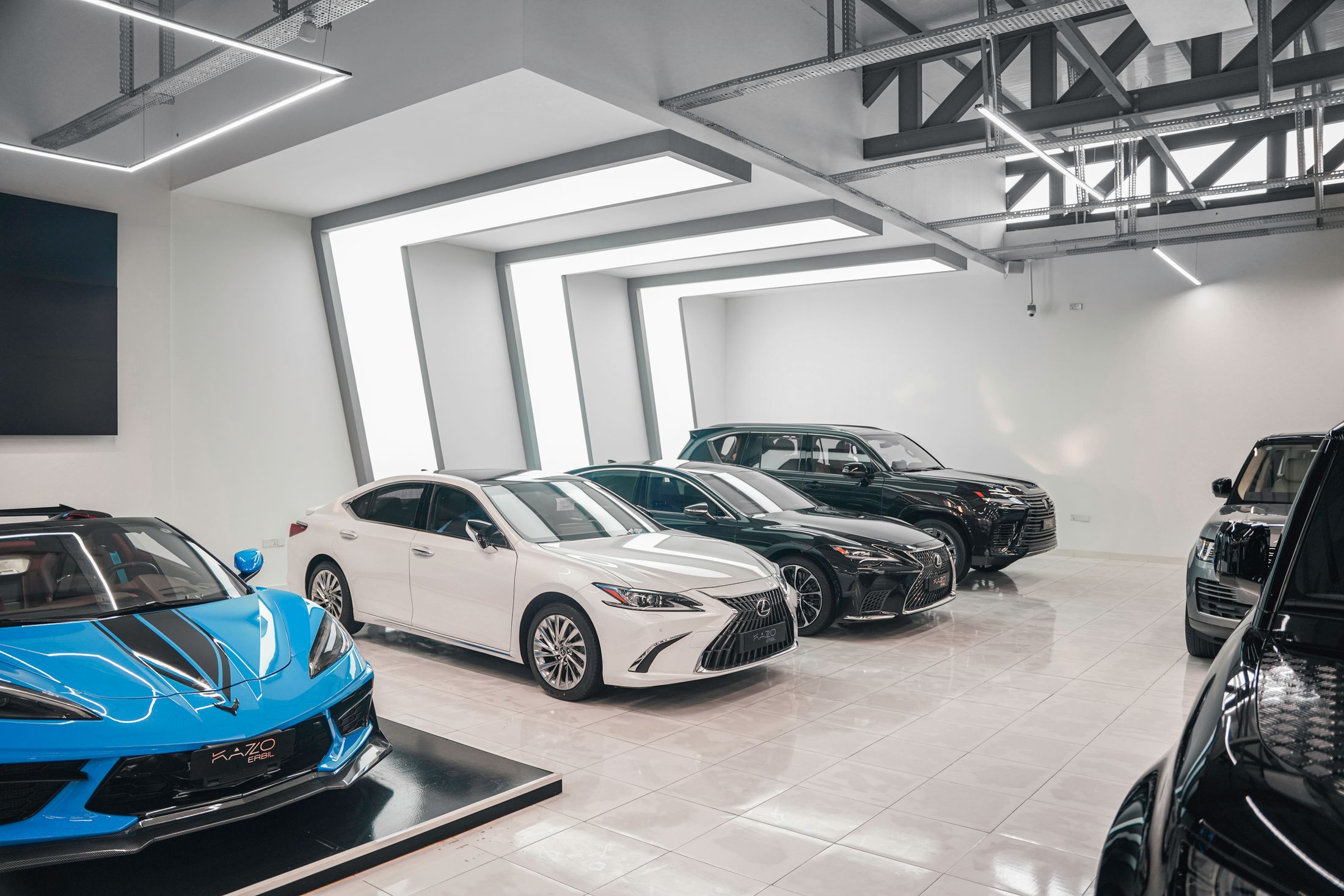 Bright, clean garage showroom with LED ceiling lights